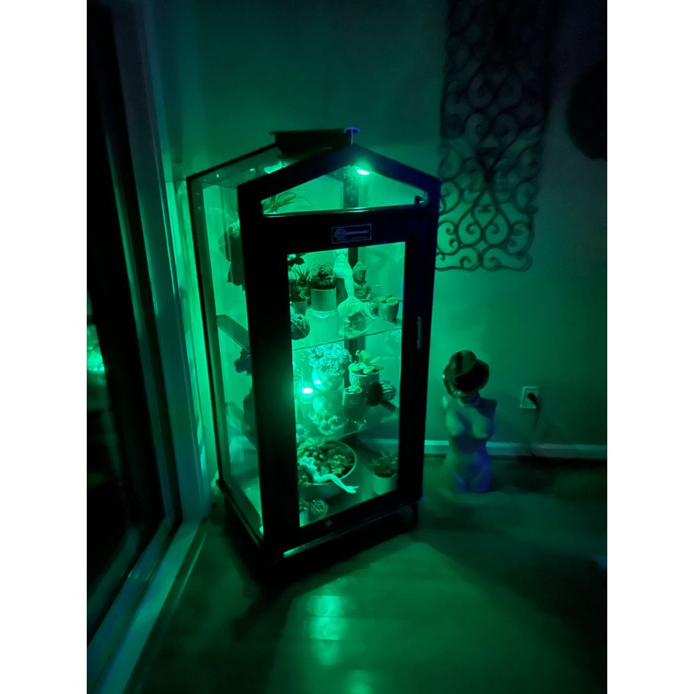 Bronze Janco Garden Curio indoors illuminated with green grow lighting and plants on glass shelves