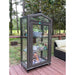 Bronze Janco Garden Curio outdoors with door closed and plants displayed on adjustable glass shelves