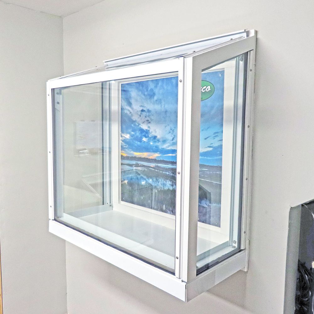 White Janco Garden Window displayed indoors, shown from an angled view
