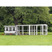 White chicken coop with black trim with an attached white wooden chicken run, outside with 3 chickens.