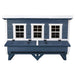 A blue and white wooden chicken coop with three front windows and a nesting box, shown on a plain white background.