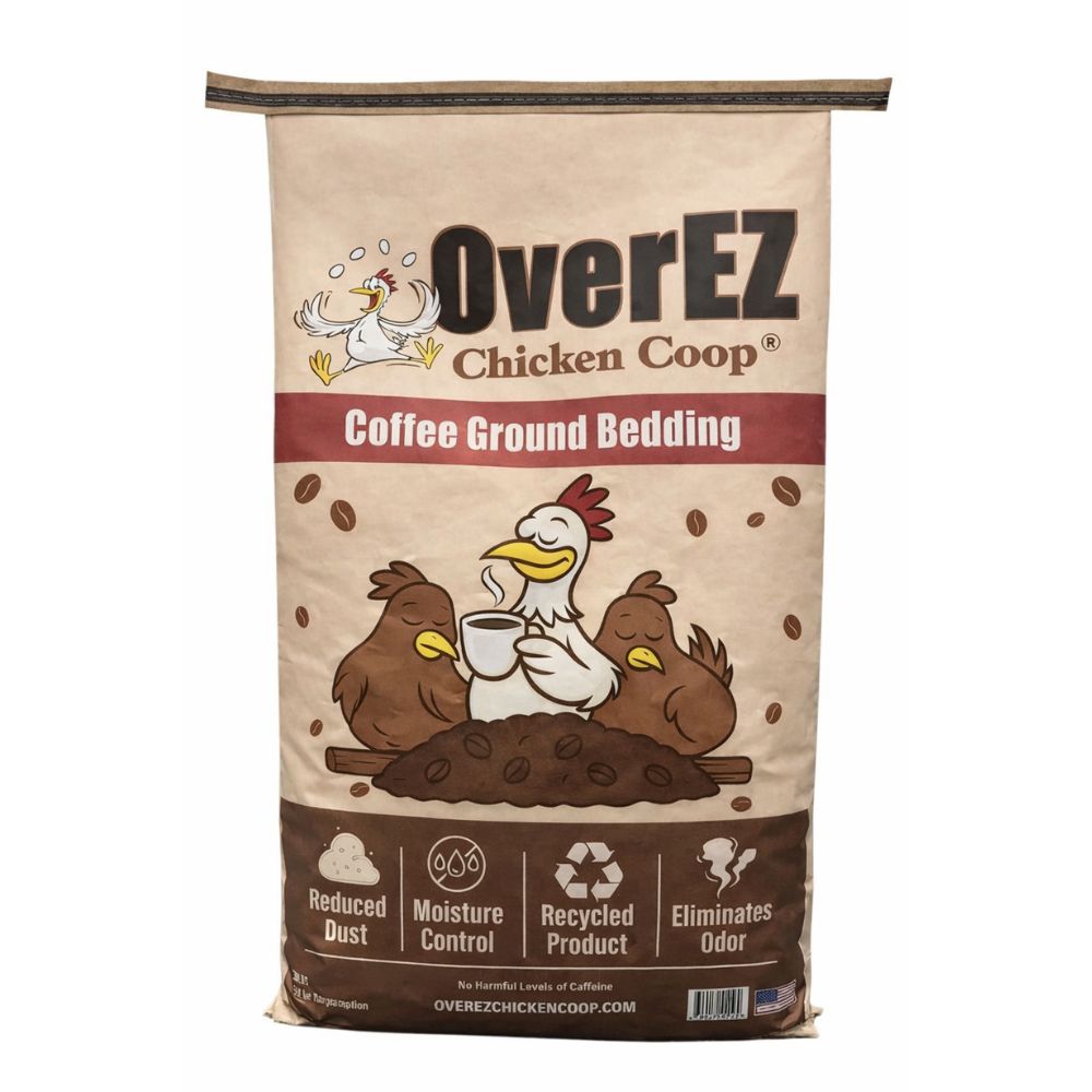 A bag of OverEZ Chicken Coop Coffee Ground Bedding on a plain white background. The packaging is beige and brown with cartoon chickens and coffee beans.
