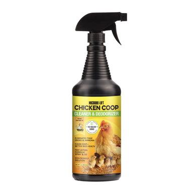Spray bottle labeled 'Chicken Coop Cleaner & Deodorizer' on a white background