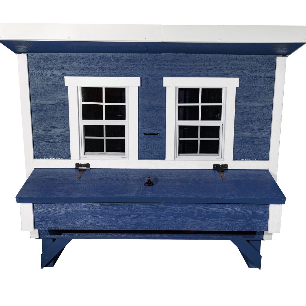 A blue and white wooden chicken coop with two white-framed windows and a nesting box.