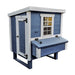 Blue and white wooden chicken coop with a nesting box and one window.