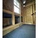 Wooden interior of a chicken coop showing the nesting box entrances.