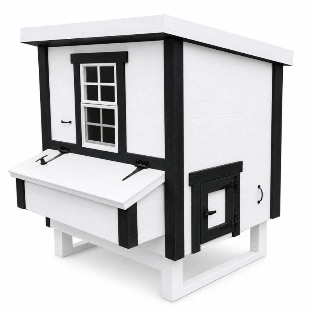 White and black chicken coop with one window, a nesting box, and chicken door.