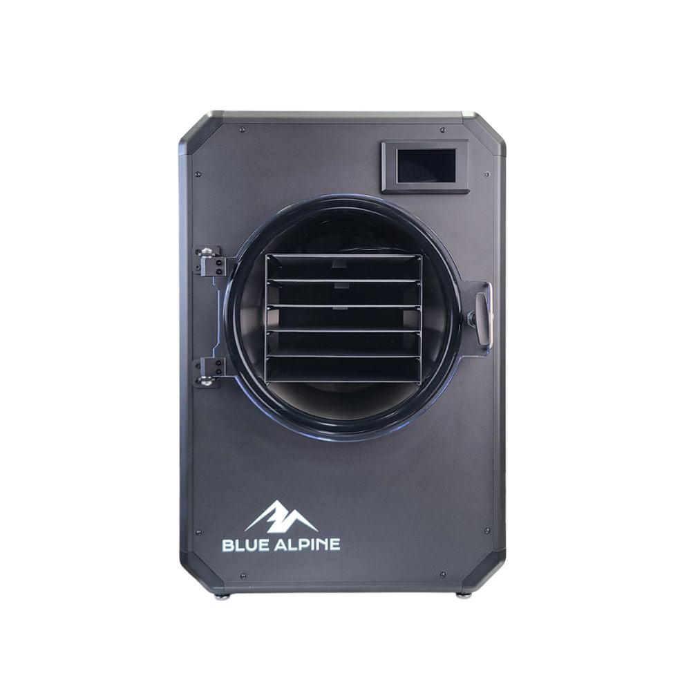 Medium Elite freeze dryer by Blue Alpine, featuring a flat black front panel with a circular transparent door, black interior racks, and a small digital display screen in the upper right corner.