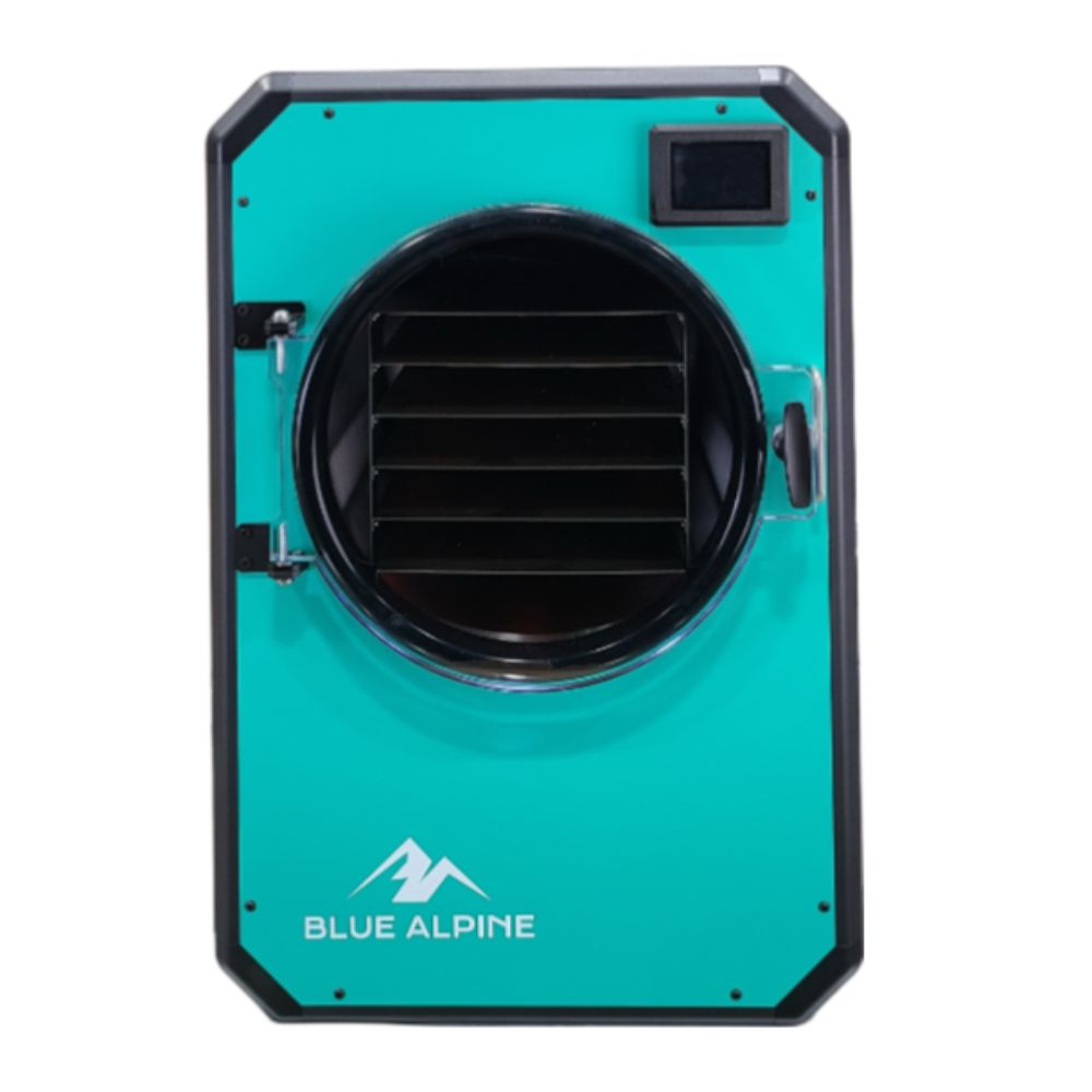Medium Elite freeze dryer by Blue Alpine, featuring a teal front panel with a circular transparent door, black interior racks, and a small digital display screen in the upper right corner.