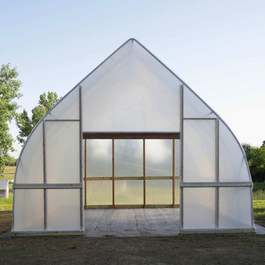 Front view of the Bootstrap Farmer DIY Gothic Greenhouse showing the tall peaked Gothic arch and greenhouse entrance