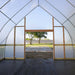 Interior view of the Bootstrap Farmer DIY Gothic Greenhouse showing the peaked Gothic frame and locally sourced wood framing