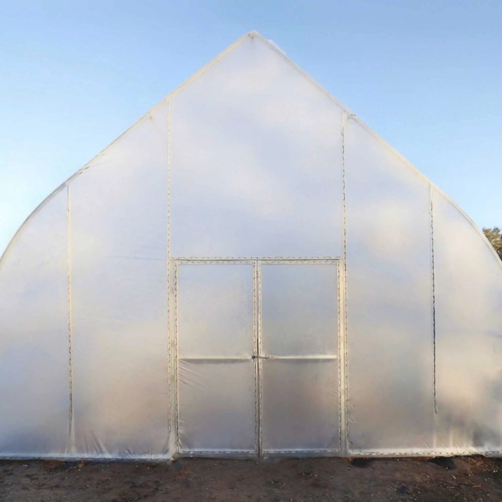 Front of the Bootstrap Farmer Gothic High Tunnel head on view with double doors.
