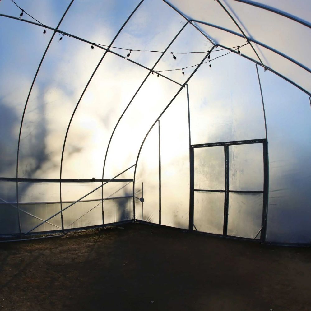 Inside angle showing double doors of the Bootstrap Farmer Gothic High Tunnel.