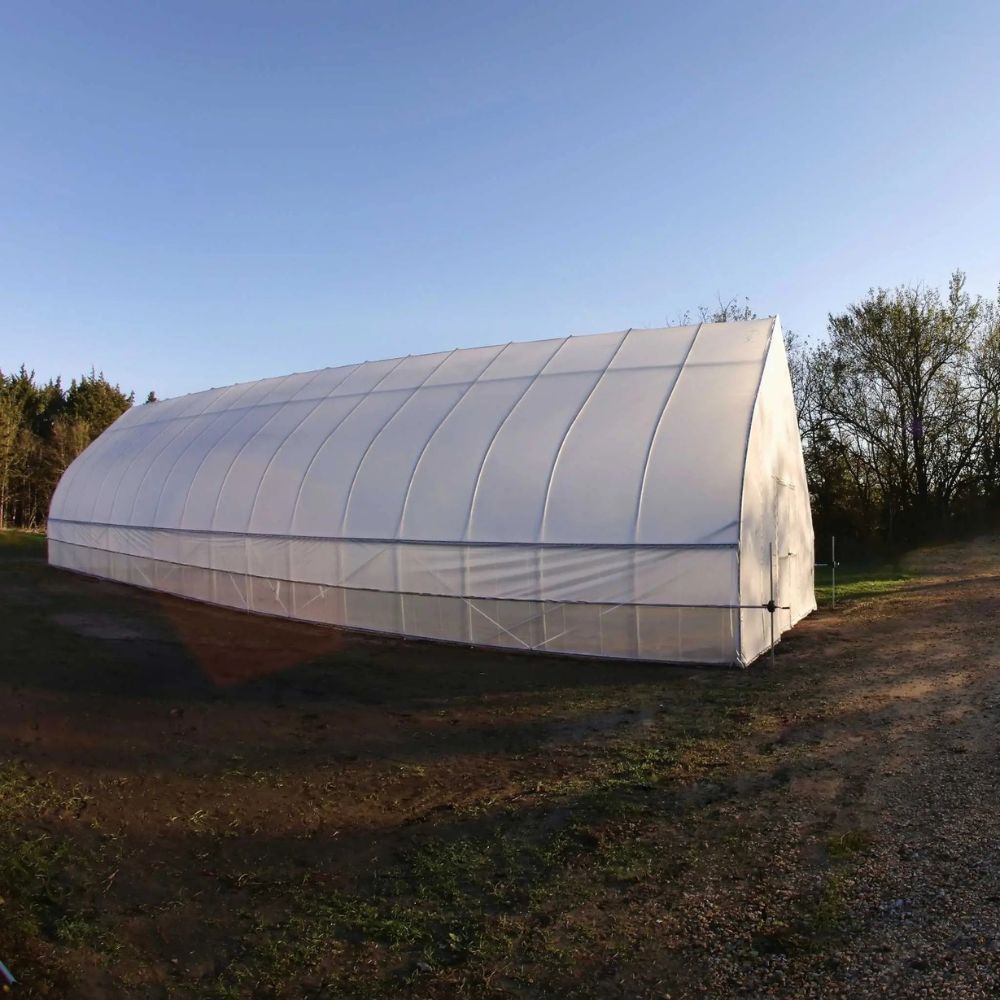 Left side of the Bootstrap Farmer Gothic High Tunnel on level ground.