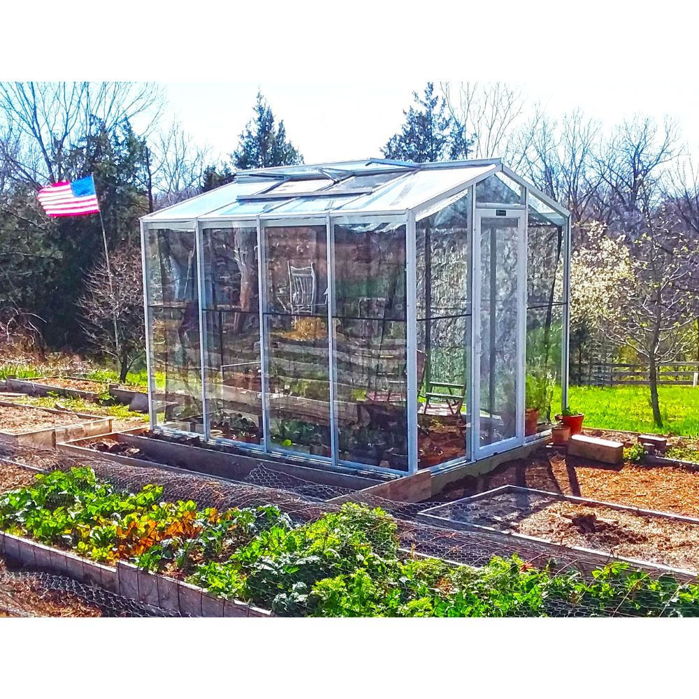 Janco Palmetto 8' x 10' white glass greenhouse with ridge vent open and interior shade cloth