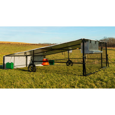 Porta Coop 10' x 12' Haven mobile chicken coop with flat-free wheels and poultry equipment