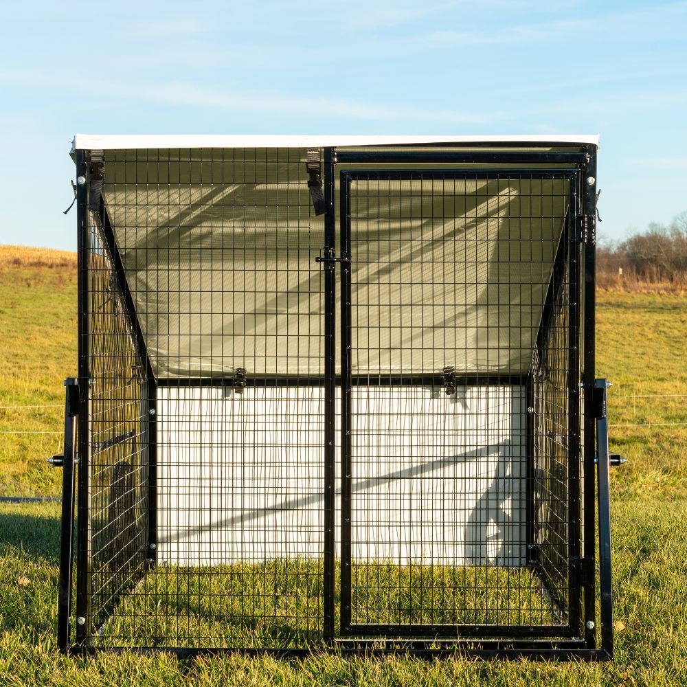 Front view of Porta Coop 4' × 5' Haven mobile chicken coop with wire door and tarp roof
