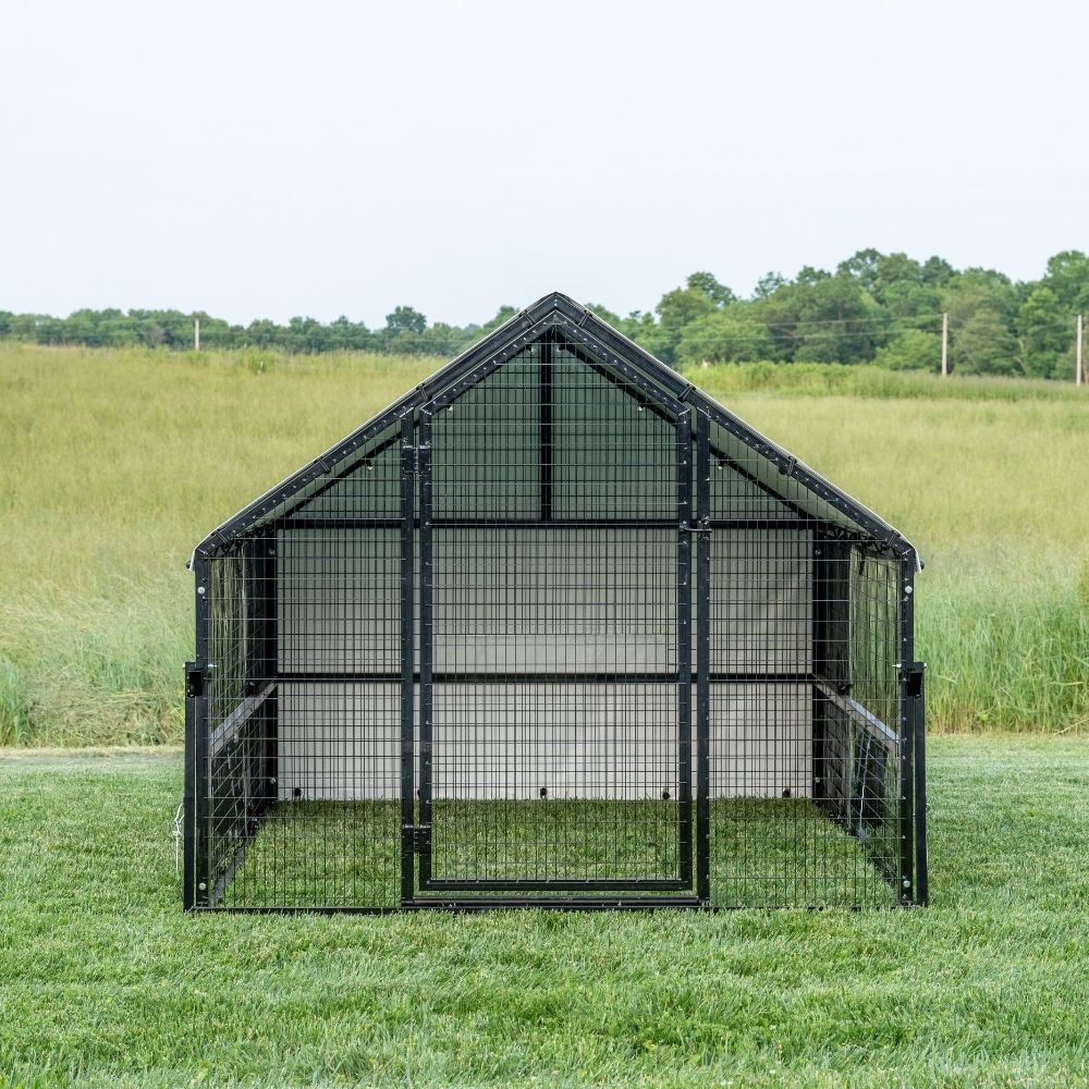 Front view of Porta Coop 6' x 8' Heritage mobile chicken coop on grass.