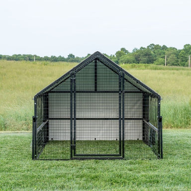 Front view of Porta Coop 6' x 8' Heritage mobile chicken coop on grass.