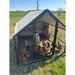 Porta Coop 6x8 Heritage mobile chicken coop with chickens inside on pasture