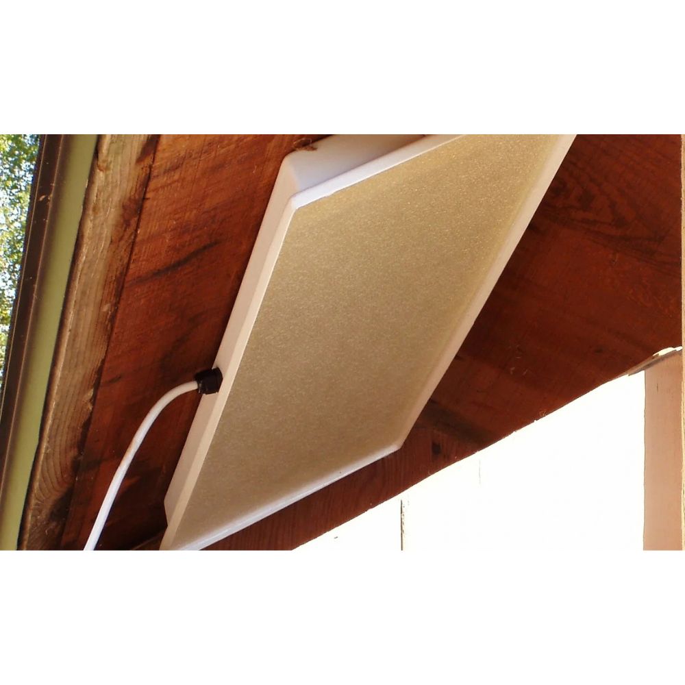 Sweeter Heater Coop & Brooder Heater side-mounted inside a wooden chicken coop.